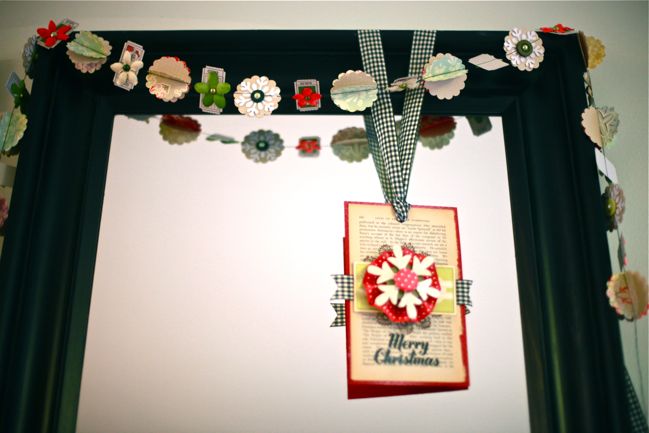 paper Christmas garland and ornament made with scrapbooking supplies