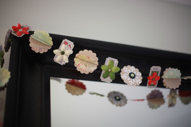 paper Christmas garland and ornament made with scrapbooking supplies