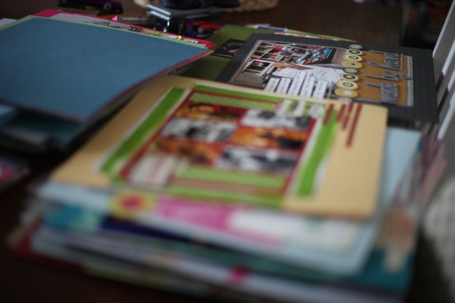 sorting scrapbook pages into albums