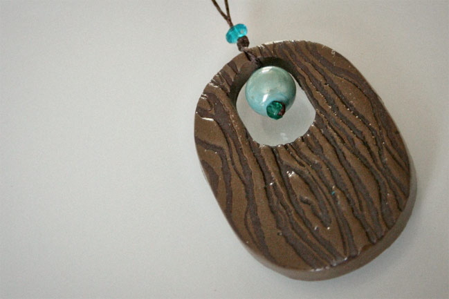 woodgrain necklace made with banana frog stamps